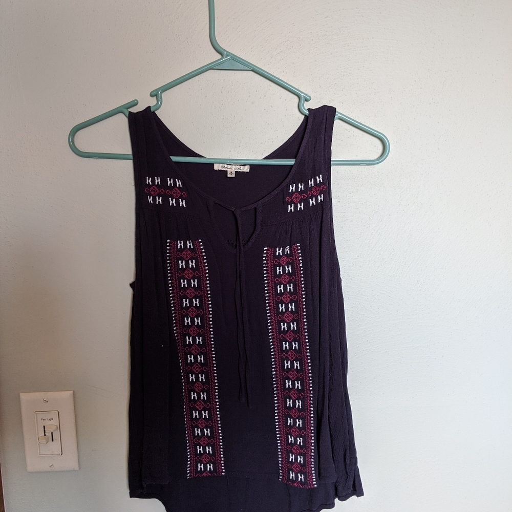 Tank top with decorative accents